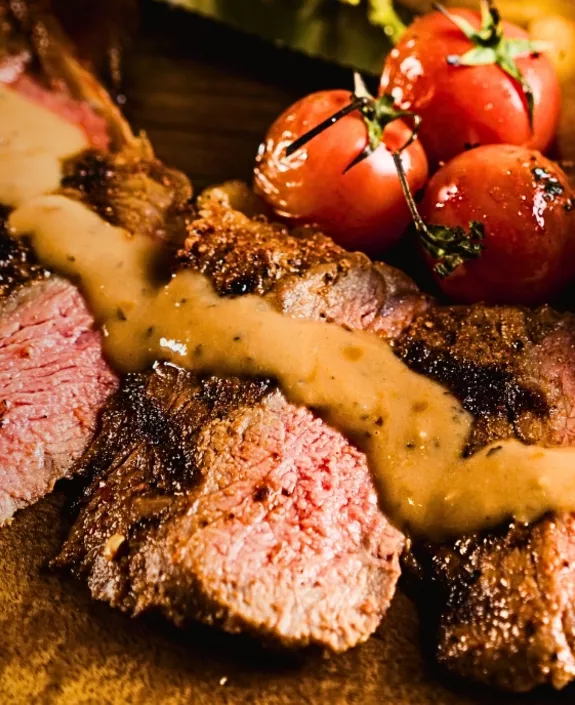 Steak on chopping board