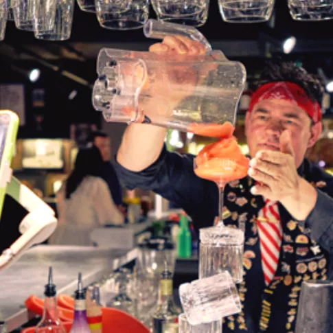 Barman making cocktail