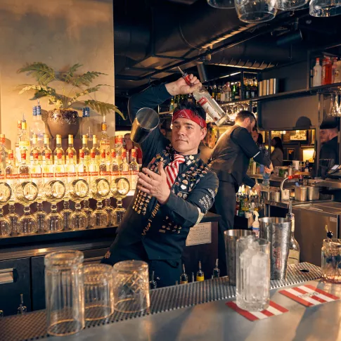 Barman making cocktail