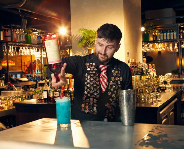 Bartender making cocktail