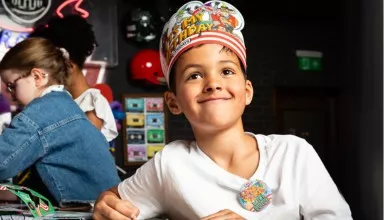 boy with birthday hat