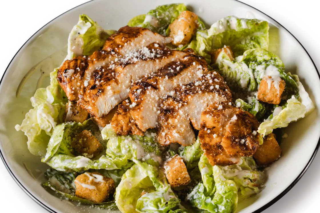 GRILLED CAJUN CHICKEN CAESAR SALAD