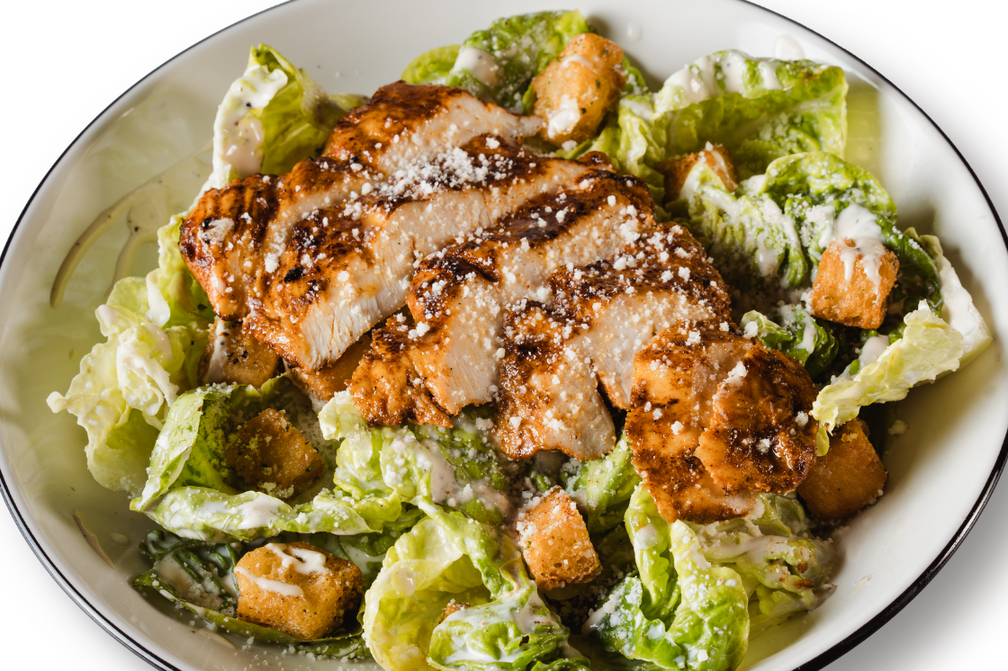 GRILLED CAJUN CHICKEN CAESAR SALAD