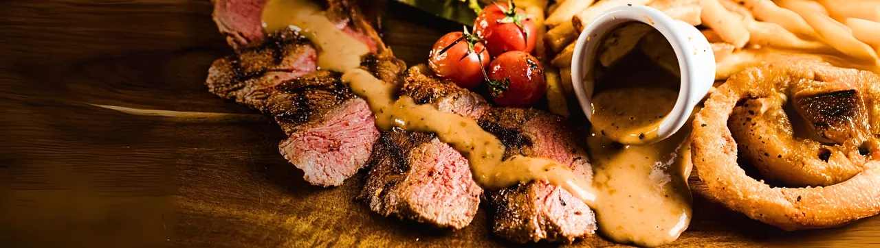 Steak on chopping board