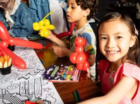 kid at birthday table