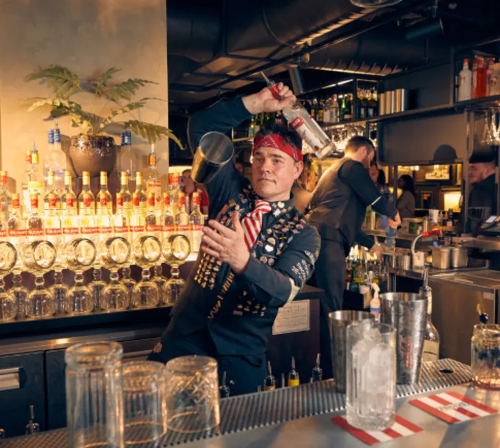 Barman making cocktail