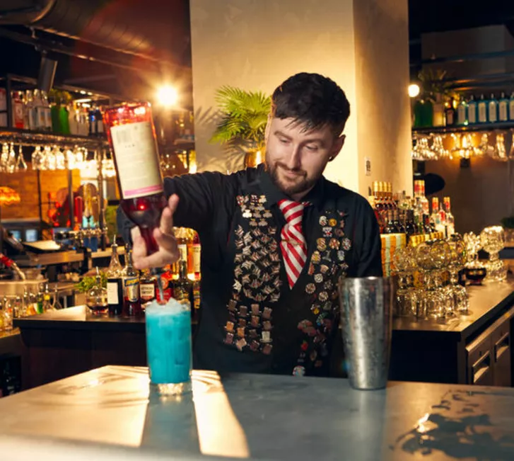 Bartender making cocktail