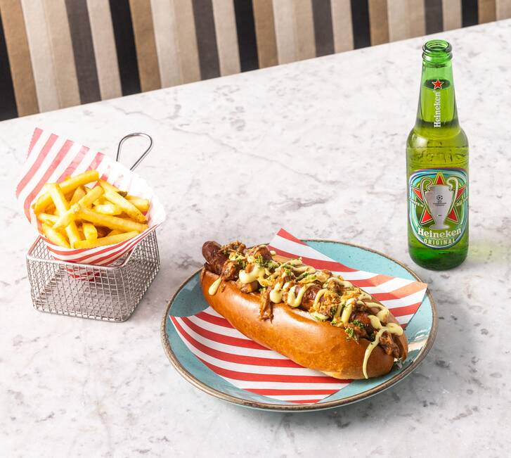 Hot dog with fries and beer