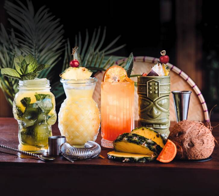 Tropical cocktail selection on table