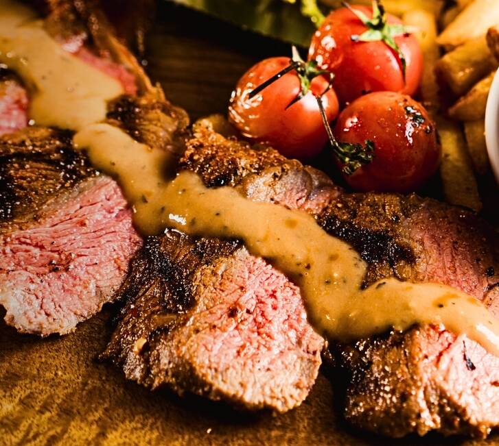 Steak on chopping board